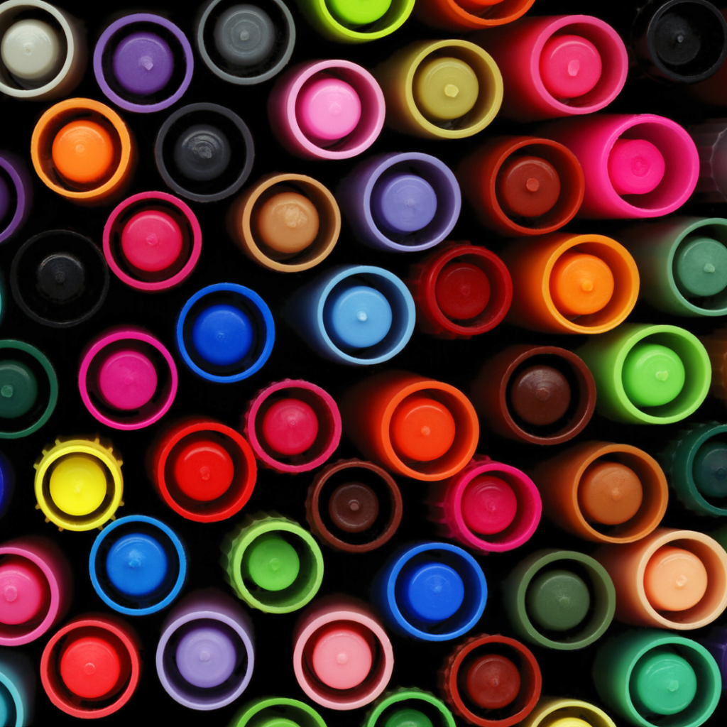 Picture of the tops of lots of different color markers. Part of an article - what is a bujo? discover the magic with this ultimate guide.