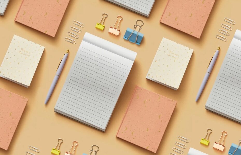 Lots of eco looking stationery laid out diagonally in an aesthetic way. Part of an article - A Comprehensive Guide to Budget and Eco Friendly Bullet Journal Supplies